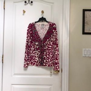 Fancy sweater with sequence and bead  detailing.